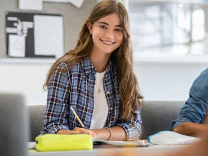 Cute girl studying chemistry ABC
